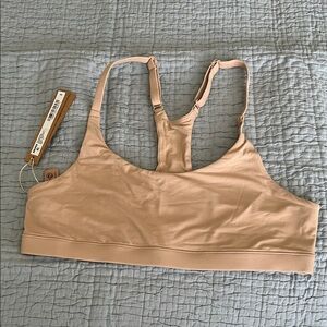 SKIMS Nude Racerback Bralette in Light Beige
